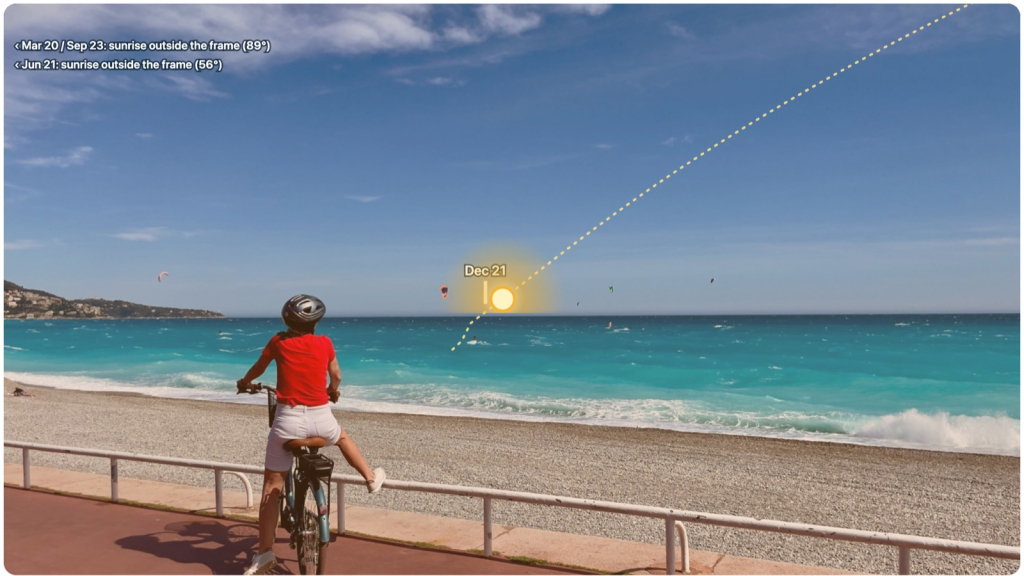 The Promenade des Anglais in December: the sun rises out of the sea to the right of Cap de Nice.
